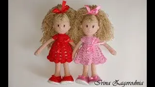 A crochet doll A knitted doll made of yarn. Amigurumi dolls Sasha and Dasha