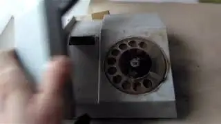 разбор дискового телефона на  металлы. Что можно найти ценного в телефоне.